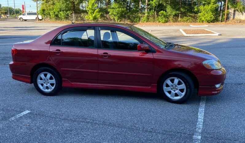 
								2003 Toyota Corolla full									