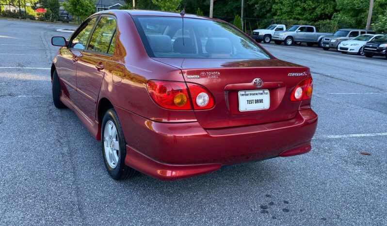 
								2003 Toyota Corolla full									