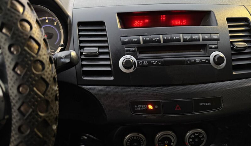 
								2009 Mitsubishi Lancer full									